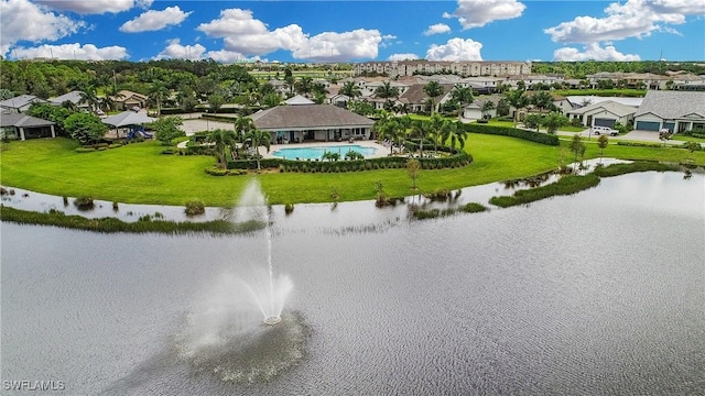 aerial view featuring a residential view and a water view