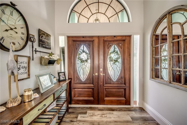 entrance foyer featuring dark hardwood / wood-style flooring