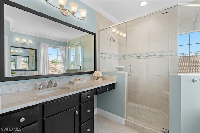 bathroom with ornamental molding, a shower with shower door, tile patterned flooring, and vanity