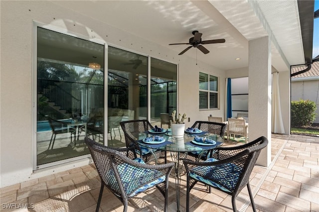 view of patio with ceiling fan