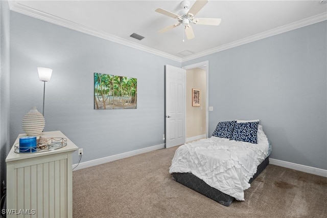 carpeted bedroom with crown molding and ceiling fan