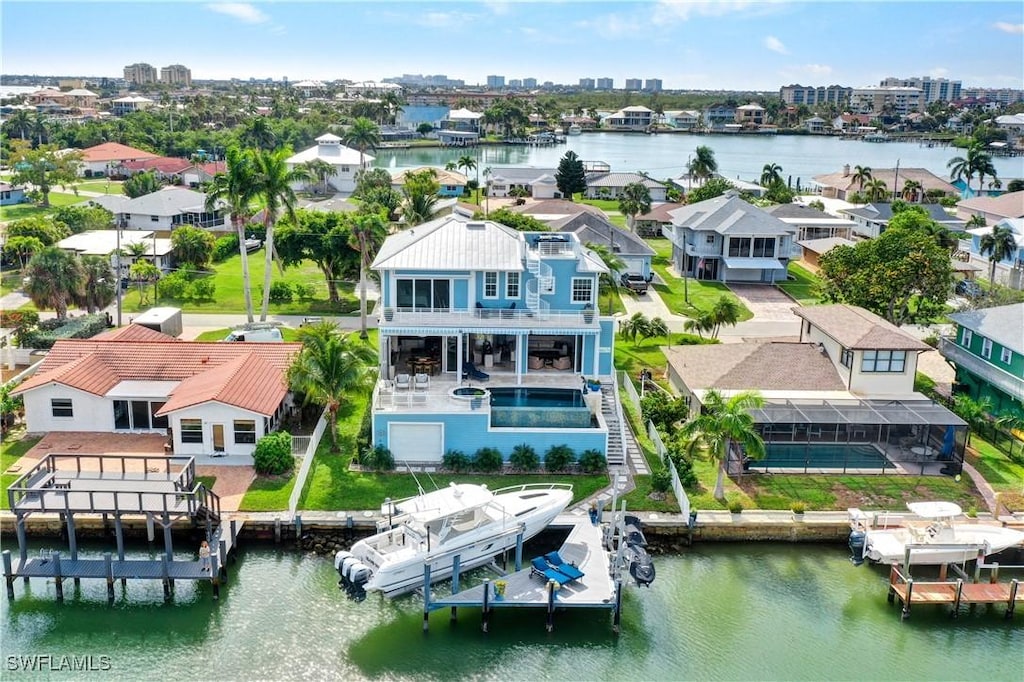 bird's eye view with a water view