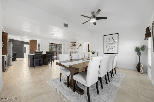 dining space featuring ceiling fan