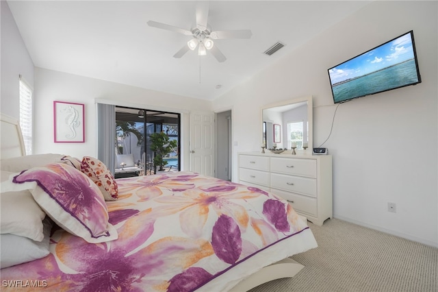 bedroom featuring light carpet, access to exterior, lofted ceiling, and ceiling fan