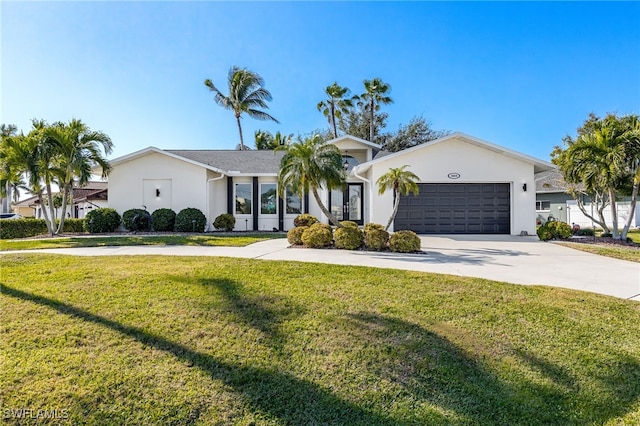 ranch-style house with a front yard and a garage