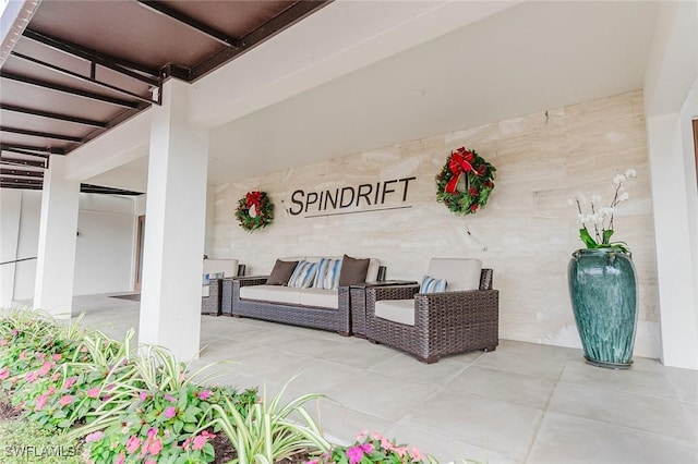 2600 Gulf Shore Blvd N Unit 32, Naples, FL 34103 - view of patio / terrace featuring outdoor lounge area