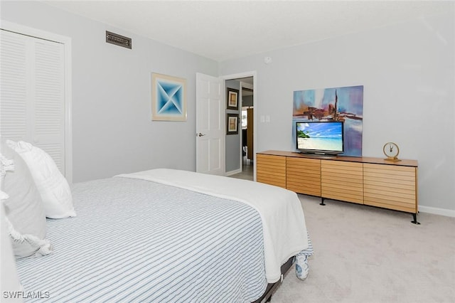 2600 Gulf Shore Blvd N Unit 32, Naples, FL 34103 - bedroom with light carpet
