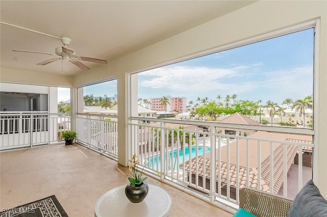 2600 Gulf Shore Blvd N Unit 32, Naples, FL 34103 - balcony featuring view of pool and ceiling fan