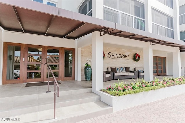 2600 Gulf Shore Blvd N Unit 32, Naples, FL 34103 - entrance to property with french doors and stucco siding