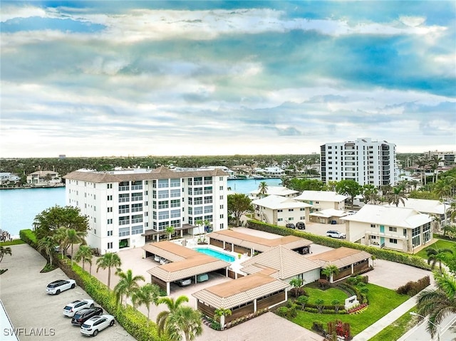 birds eye view of property featuring a water view