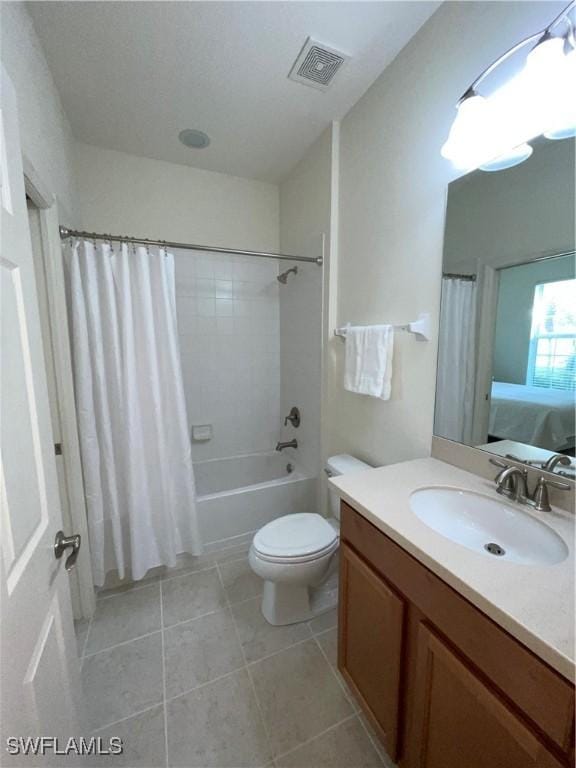 full bathroom with tile patterned flooring, vanity, toilet, and shower / bathtub combination with curtain