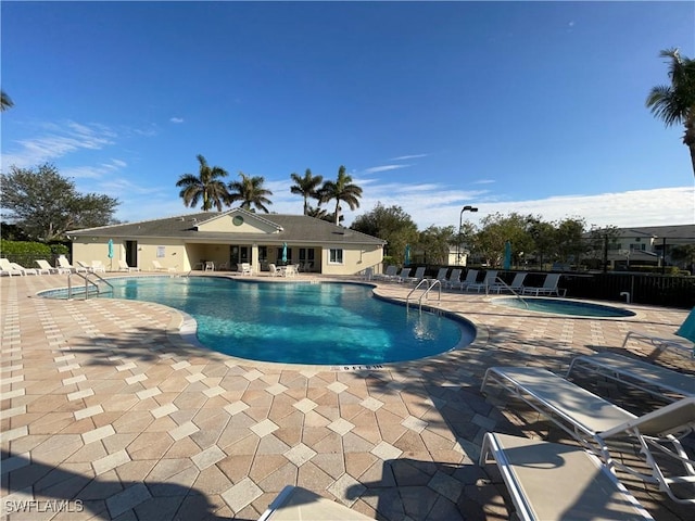 view of pool with a patio area