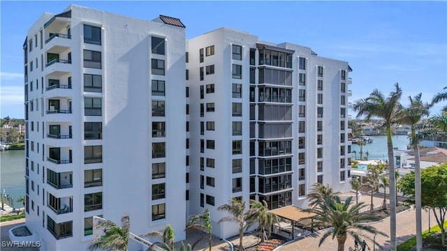 view of building exterior featuring a water view