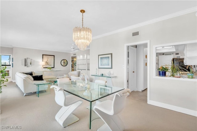 dining area with crown molding, light carpet, and an inviting chandelier