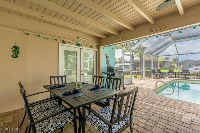 exterior space with ceiling fan and a lanai