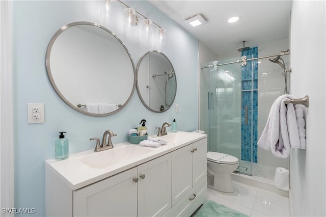 bathroom featuring tile patterned floors, vanity, an enclosed shower, and toilet