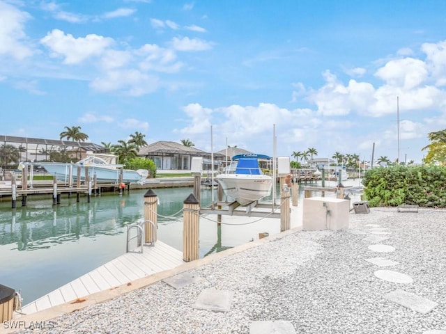 dock area with a water view