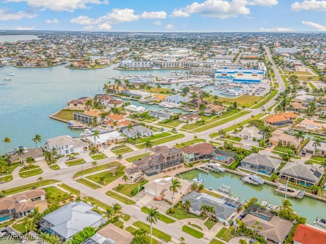 bird's eye view with a water view