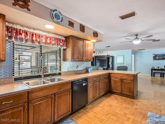 kitchen with light parquet floors, sink, ceiling fan, black dishwasher, and kitchen peninsula