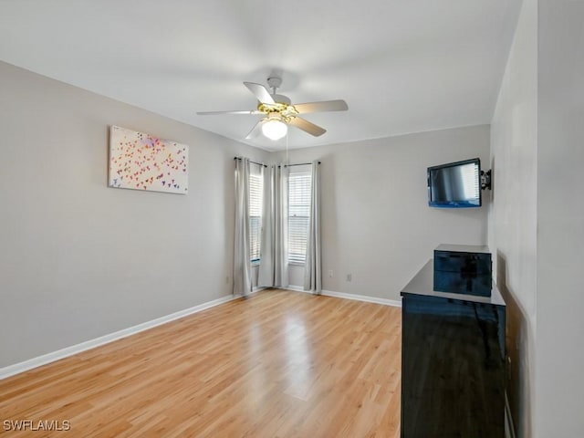 851 Perrine Ct, Marco Island, FL 34145 - unfurnished living room with ceiling fan and light wood-type flooring