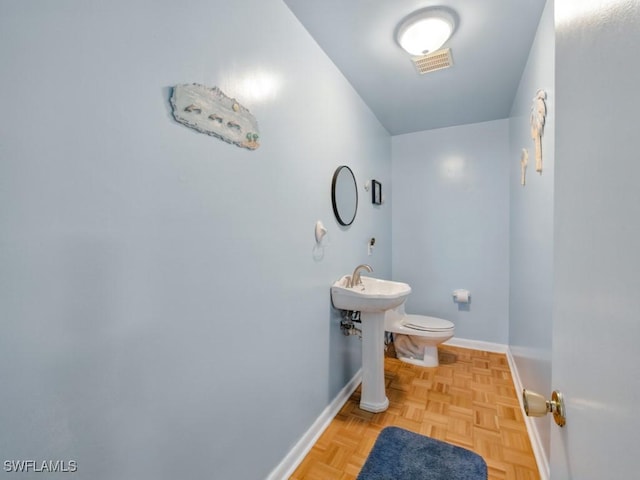 851 Perrine Ct, Marco Island, FL 34145 - half bath with baseboards and toilet