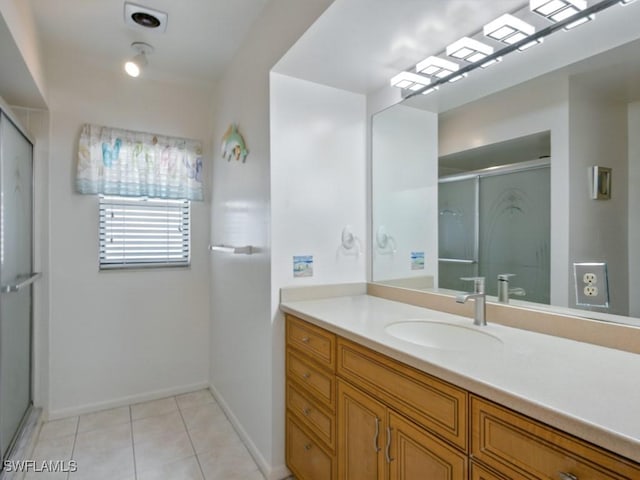 851 Perrine Ct, Marco Island, FL 34145 - full bath with vanity, a shower with shower door, and tile patterned floors