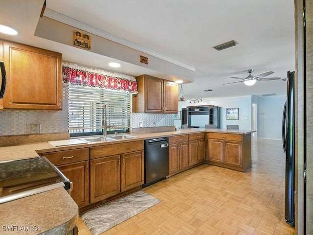 851 Perrine Ct, Marco Island, FL 34145 - kitchen with black appliances, a peninsula, backsplash, brown cabinetry, and ornamental molding