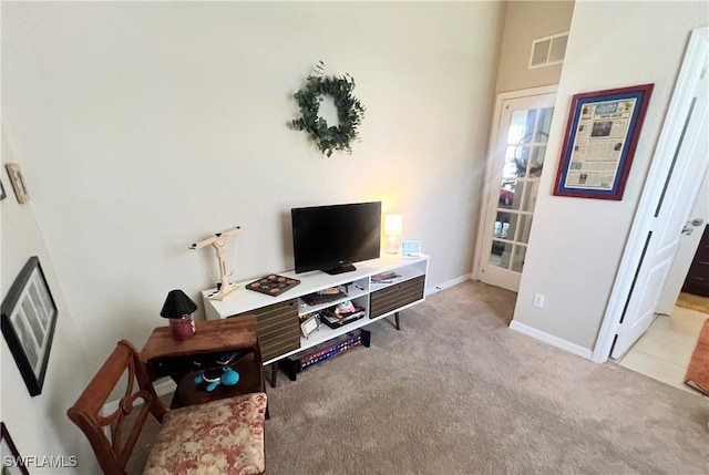 office area featuring light colored carpet