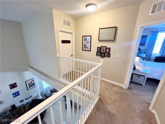 hallway with carpet