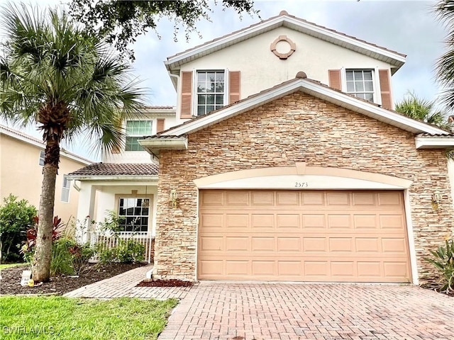 view of front of house with a garage