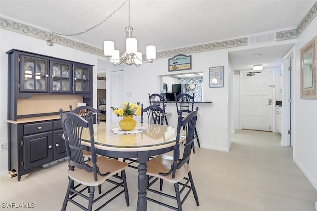 dining room with an inviting chandelier