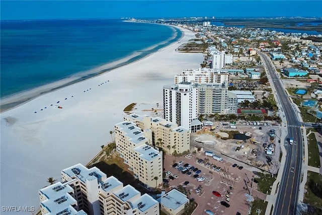 aerial view featuring a water view and a beach view