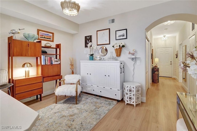 sitting room with light wood-type flooring