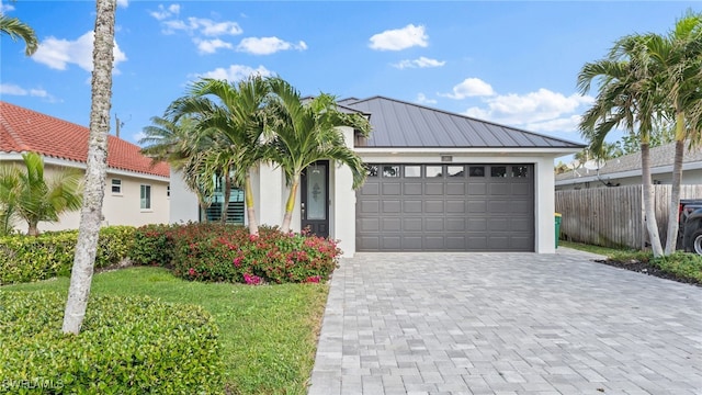 view of front of home featuring a garage