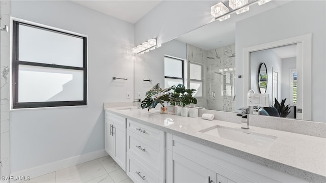 bathroom with vanity and walk in shower