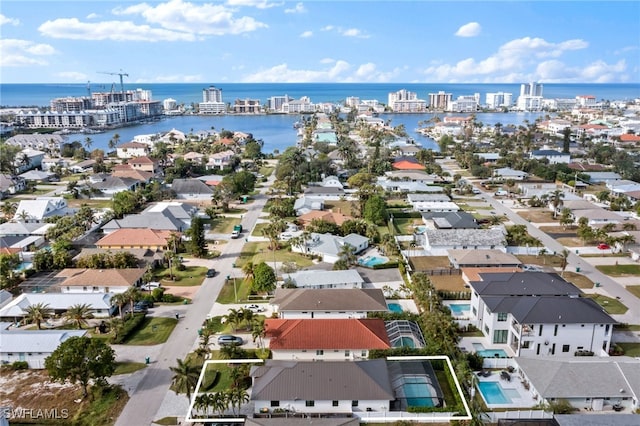 drone / aerial view with a water view