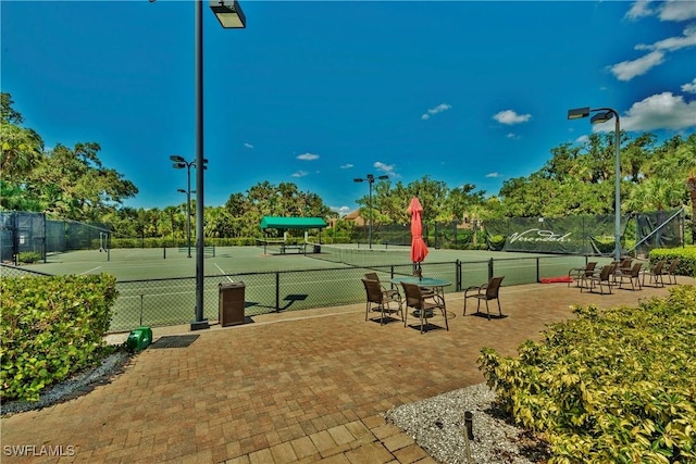 exterior space with tennis court