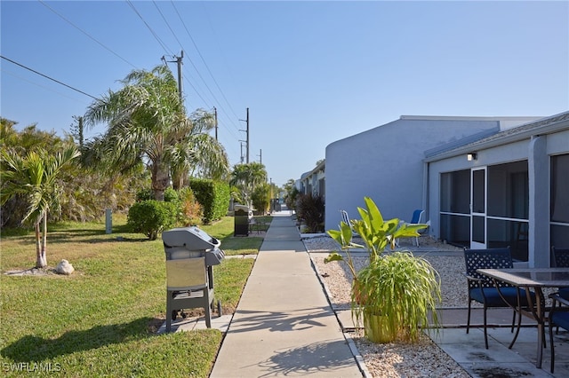 view of community featuring a yard