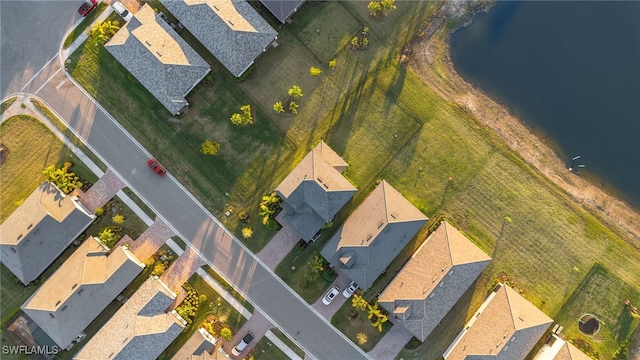 drone / aerial view featuring a water view