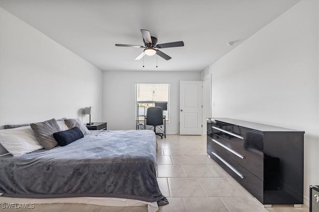 bedroom featuring ceiling fan and light tile patterned flooring