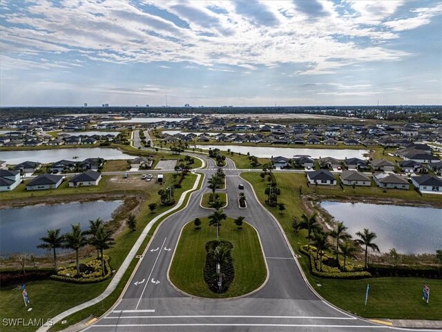 bird's eye view with a water view