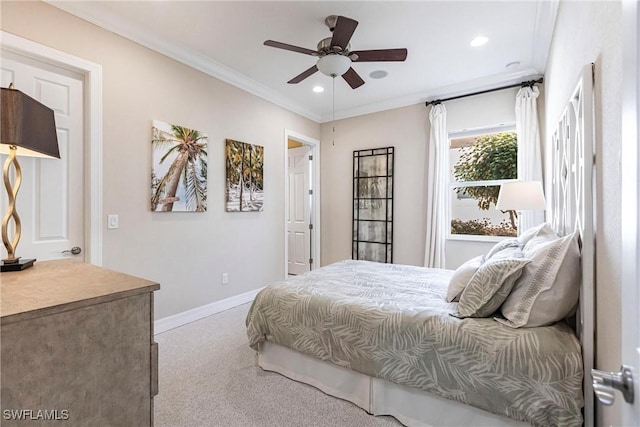 bedroom featuring light carpet, ceiling fan, and crown molding