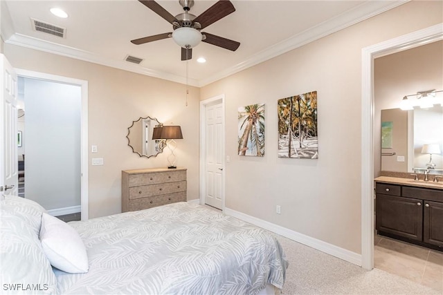 bedroom with ensuite bath, ceiling fan, ornamental molding, and sink