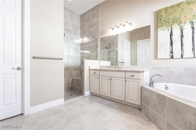 bathroom featuring vanity, tile patterned floors, and independent shower and bath