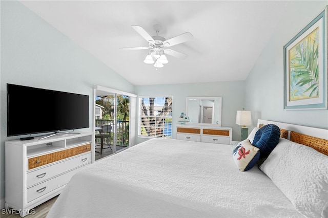 bedroom featuring hardwood / wood-style floors, ceiling fan, lofted ceiling, and access to outside