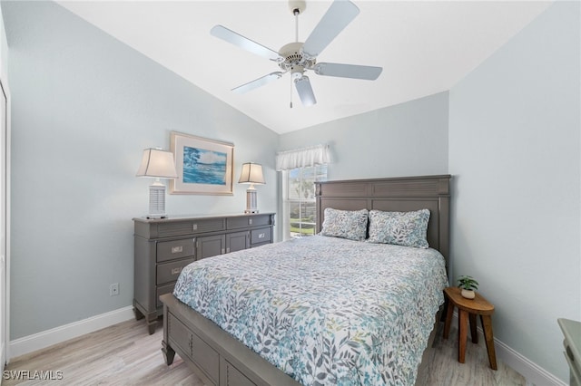13120 Castle Harbour Dr Unit N4, Naples, FL 34110 - bedroom with light wood-type flooring, baseboards, lofted ceiling, and a ceiling fan