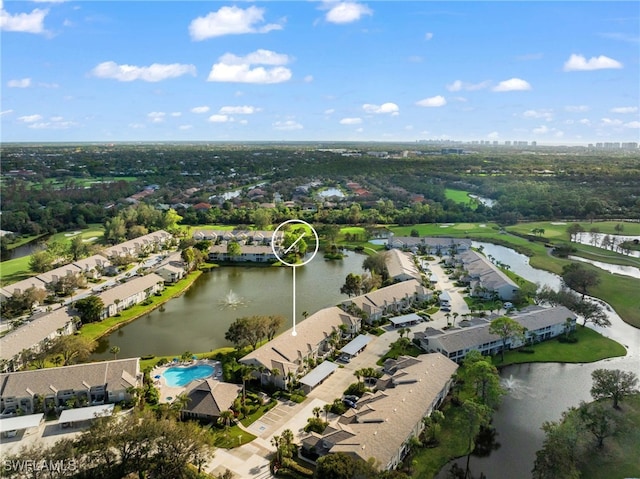 drone / aerial view with a water view