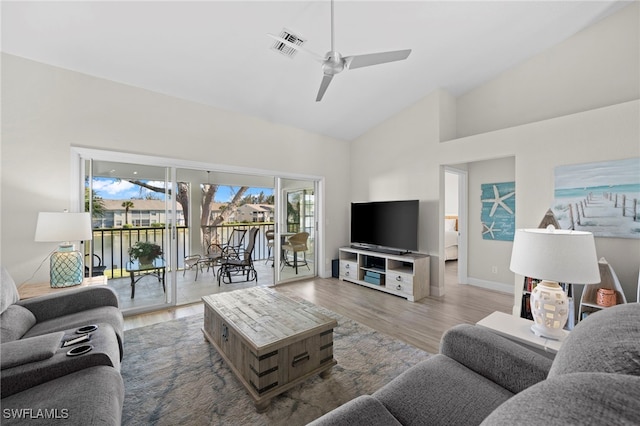 13120 Castle Harbour Dr Unit N4, Naples, FL 34110 - living room with a ceiling fan, high vaulted ceiling, and wood finished floors