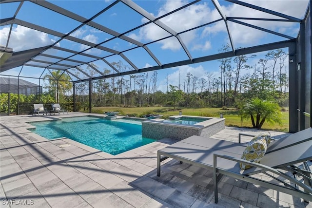 view of swimming pool featuring a patio, a lanai, and a pool with connected hot tub