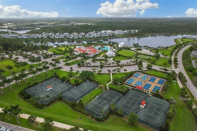 birds eye view of property with a water view